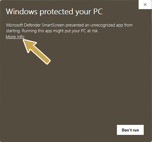 Microsoft Defender SmartScreen first screen with an arrow pointing to More info.